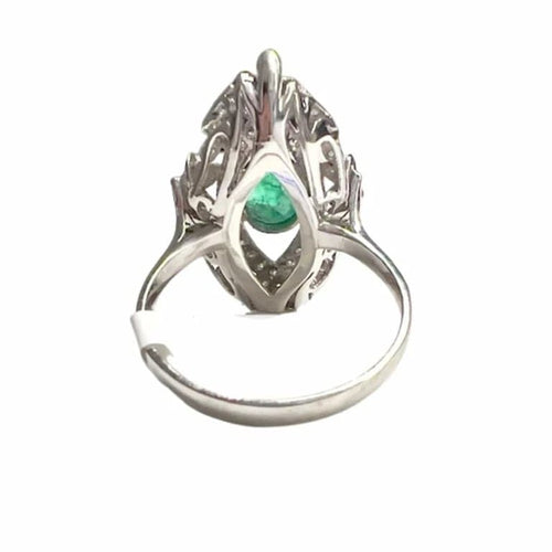 Bague 58.5 Bague navette Art déco en platine 950 ornée de diamants et d’émeraudes 58 Facettes Q892A