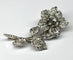 Broche Broche florale rétro années 40 en or blanc 18 carats et diamants 58 Facettes E31