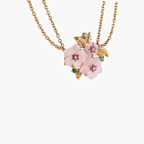 Collier Collier trois fleurs en or jaune 18K avec diamants et pierres 58 Facettes AB105
