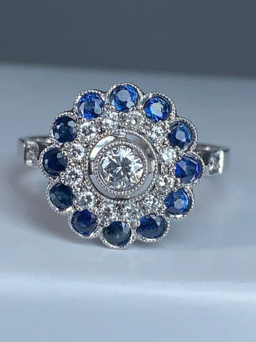 Bague 57 Bague fleur Art déco en or 18 ct, diamants et saphirs 58 Facettes AB45