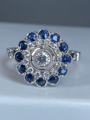 Bague 57 Bague fleur Art déco en or 18 ct, diamants et saphirs 58 Facettes AB45