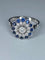 Bague 57 Bague fleur Art déco en or 18 ct, diamants et saphirs 58 Facettes AB45