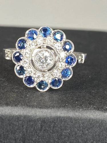 Bague 57 Bague fleur Art déco en or 18 ct, diamants et saphirs 58 Facettes AB45