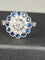 Bague 57 Bague fleur Art déco en or 18 ct, diamants et saphirs 58 Facettes AB45