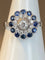 Bague 57 Bague fleur Art déco en or 18 ct, diamants et saphirs 58 Facettes AB45