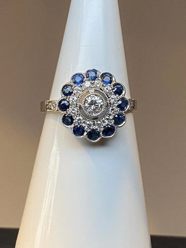 Bague 57 Bague fleur Art déco en or 18 ct, diamants et saphirs 58 Facettes AB45