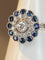 Bague 57 Bague fleur Art déco en or 18 ct, diamants et saphirs 58 Facettes AB45