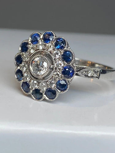 Bague 57 Bague fleur Art déco en or 18 ct, diamants et saphirs 58 Facettes AB45