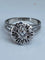 Bague 63 Bague fleur en or blanc 18 carats et diamants 58 Facettes AB60