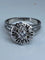 Bague 63 Bague fleur en or blanc 18 carats et diamants 58 Facettes AB60