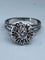Bague 63 Bague fleur en or blanc 18 carats et diamants 58 Facettes AB60
