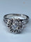 Bague 63 Bague fleur en or blanc 18 carats et diamants 58 Facettes AB60