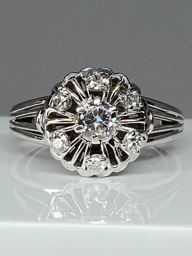 Bague 63 Bague fleur en or blanc 18 carats et diamants 58 Facettes AB60