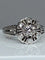 Bague 63 Bague fleur en or blanc 18 carats et diamants 58 Facettes AB60
