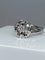 Bague 63 Bague fleur en or blanc 18 carats et diamants 58 Facettes AB60