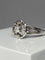 Bague 63 Bague fleur en or blanc 18 carats et diamants 58 Facettes AB60