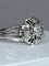 Bague 63 Bague fleur en or blanc 18 carats et diamants 58 Facettes AB60