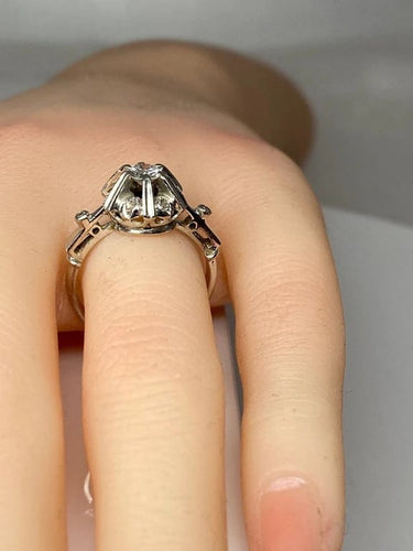Bague 51 Bague solitaire en or gris 18 carats et diamants 58 Facettes AB72bis