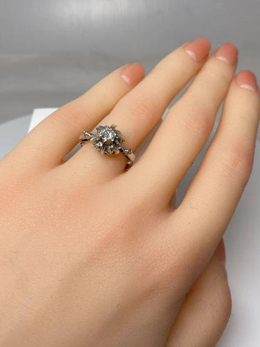 Bague 51 Bague solitaire en or gris 18 carats et diamants 58 Facettes AB72bis