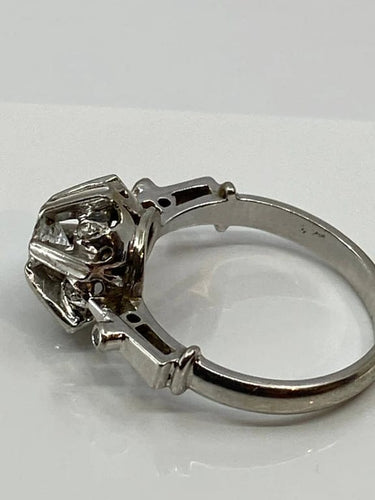 Bague 51 Bague solitaire en or gris 18 carats et diamants 58 Facettes AB72bis