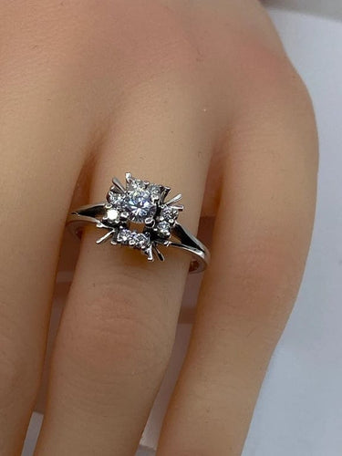Bague 55 Bague marguerite en or blanc 18 carats et diamants 58 Facettes AB72