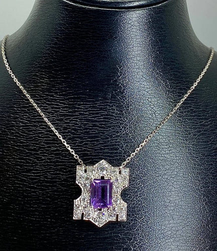 Pendentif Pendentif en platine à améthyste et diamants 58 Facettes AB109