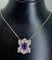 Pendentif Pendentif en platine à améthyste et diamants 58 Facettes AB109