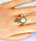 Bague 56 Bague en or jaune et or blanc 18 carats, opale, émeraude et diamants 58 Facettes AB226
