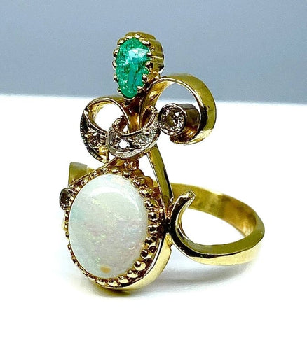 Bague 56 Bague en or jaune et or blanc 18 carats, opale, émeraude et diamants 58 Facettes AB226