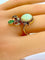 Bague 56 Bague en or jaune et or blanc 18 carats, opale, émeraude et diamants 58 Facettes AB226