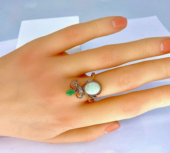 Bague 56 Bague en or jaune et or blanc 18 carats, opale, émeraude et diamants 58 Facettes AB226