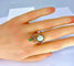 Bague 56 Bague en or jaune et or blanc 18 carats, opale, émeraude et diamants 58 Facettes AB226