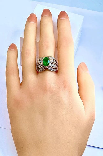 Bague 58 Bague en or jaune et blanc 18 carats avec émeraude et diamants 58 Facettes AB228