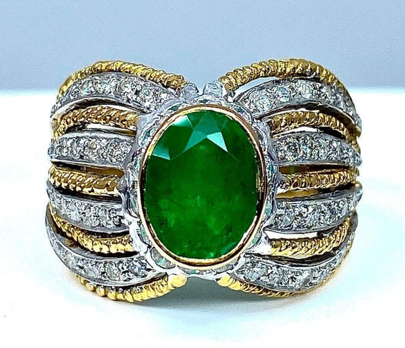 Bague 58 Bague en or jaune et blanc 18 carats avec émeraude et diamants 58 Facettes AB228