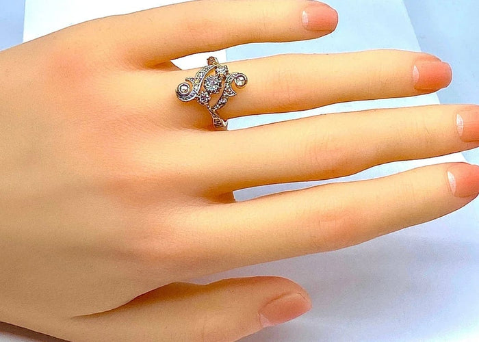 Bague 50 Bague en or jaune et blanc 18 carats avec diamants 58 Facettes AB244
