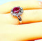 Bague 50 Bague marguerite rubis et diamants en or blanc 18 carats 58 Facettes AB248