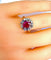 Bague 50 Bague marguerite rubis et diamants en or blanc 18 carats 58 Facettes AB248