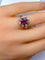 Bague 50 Bague marguerite rubis et diamants en or blanc 18 carats 58 Facettes AB248