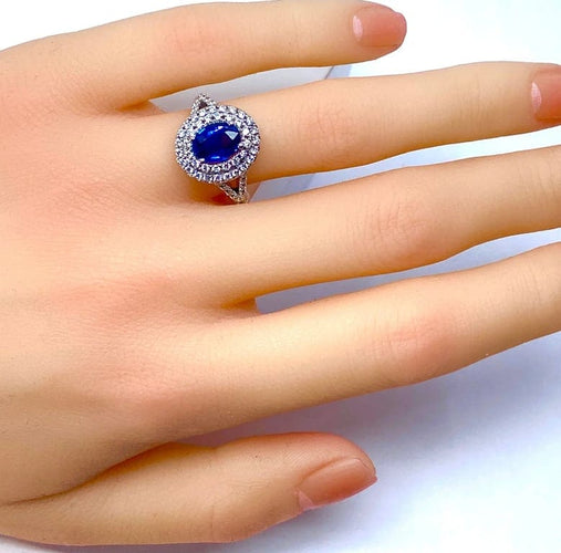 Bague 52 Bague entourage en or blanc 18 carats saphir et diamants 58 Facettes AB251