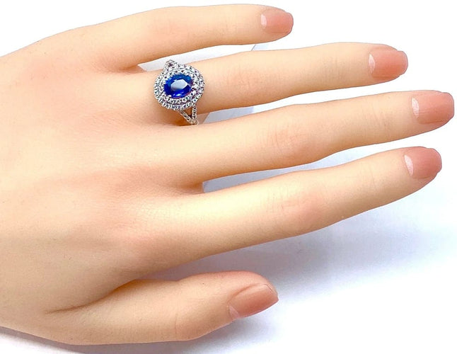 Bague 52 Bague entourage en or blanc 18 carats saphir et diamants 58 Facettes AB251