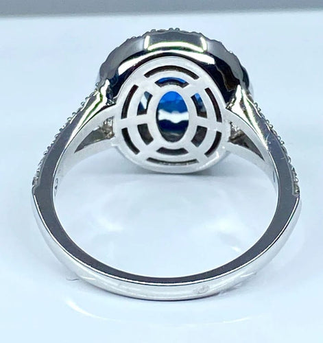 Bague 52 Bague entourage en or blanc 18 carats saphir et diamants 58 Facettes AB251