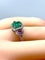 Bague 52 Bague en or blanc 18 carats avec émeraude, rubis et diamants 58 Facettes AB249