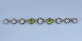 Broche Broche barrette en or 18 carats et platine, perles et péridots 58 Facettes AB275
