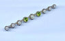 Broche Broche barrette en or 18 carats et platine, perles et péridots 58 Facettes AB275