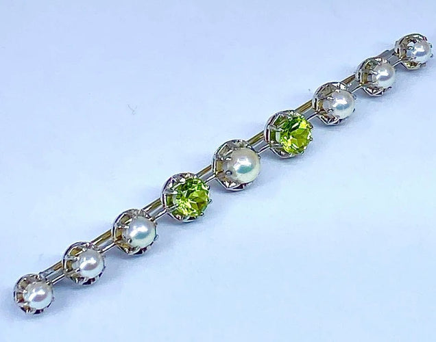 Broche Broche barrette en or 18 carats et platine, perles et péridots 58 Facettes AB275
