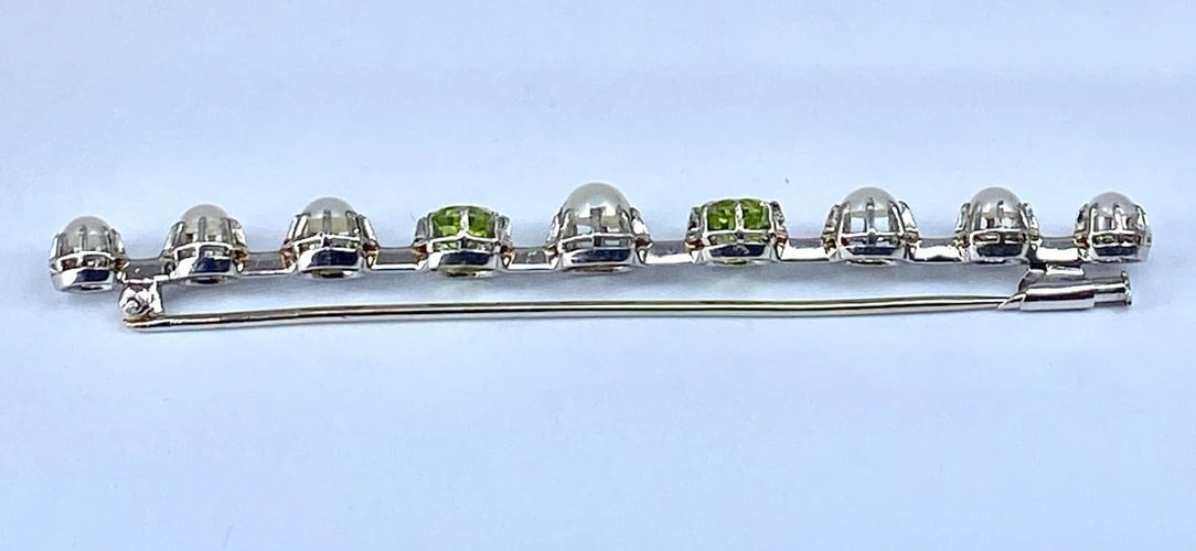 Broche Broche barrette en or 18 carats et platine, perles et péridots 58 Facettes AB275