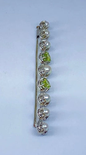 Broche Broche barrette en or 18 carats et platine, perles et péridots 58 Facettes AB275