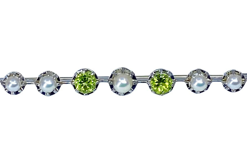 Broche Broche barrette en or 18 carats et platine, perles et péridots 58 Facettes AB275