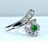 Bague 48 Bague fleur en or blanc 18 carats avec émeraude et diamants 58 Facettes AB294