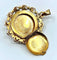 Pendentif Pendentif porte-photo en or jaune 18 carats, perle de culture et pierres rouges 58 Facettes AB307